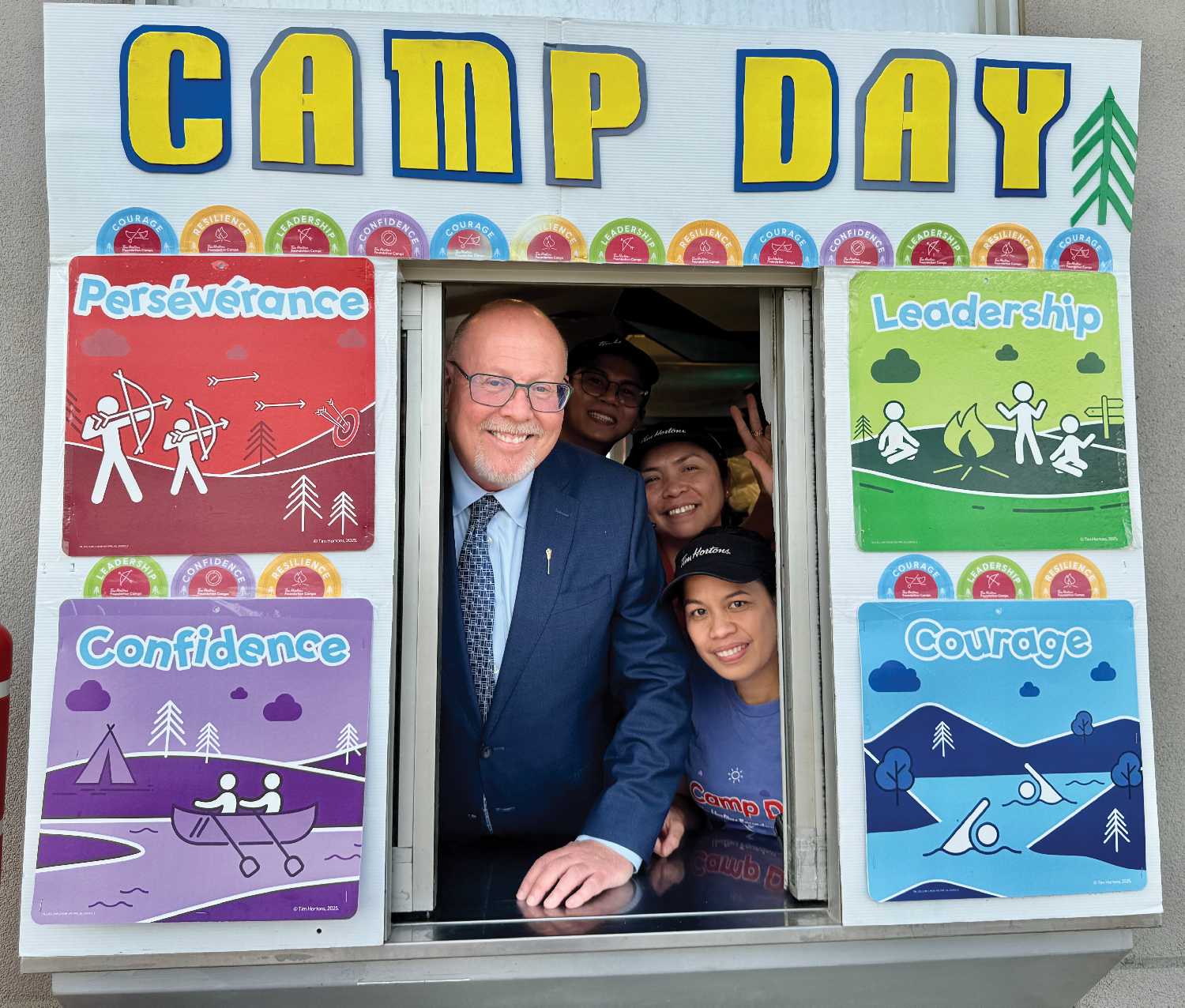 Tim Hortons Moosomin staff and MLA Kevin Weedmark serving coffee on Camp Day in Moosomin.
